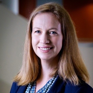 Headshot of Carmen Huckel Schneider